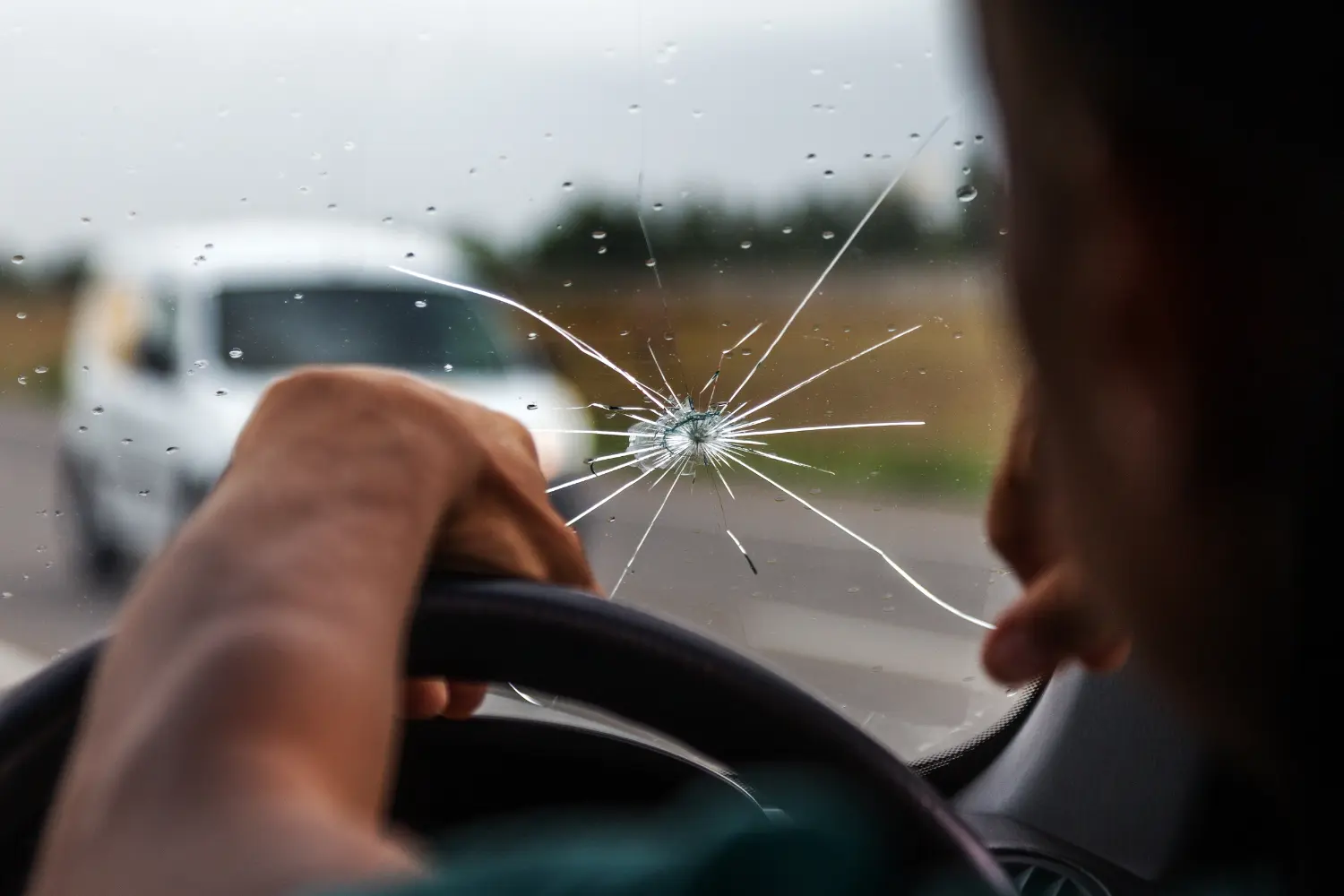 car windscreen with stone chip in it that needs repair